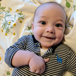 conception | smiling newborn baby boy Charlie | Reproductive Science Center of the Bay Area