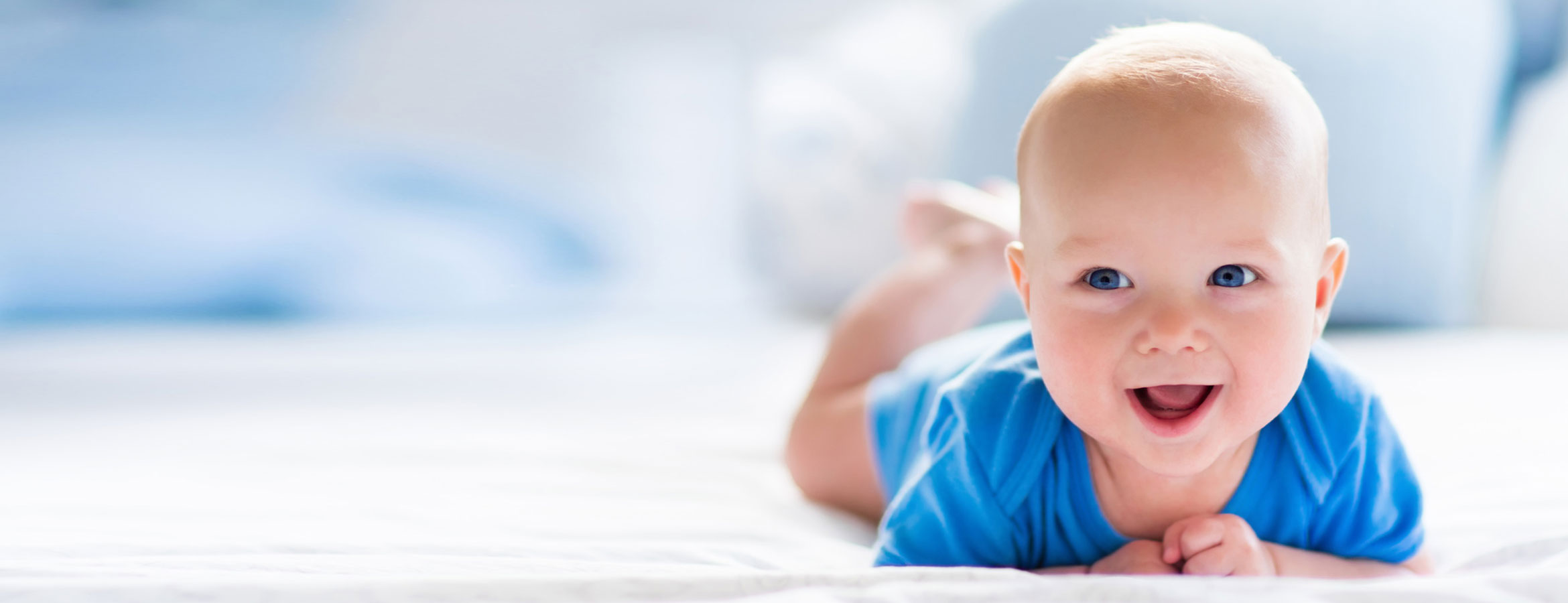 Educate Yourself about IVF success rates | slideshow - baby in blue outfit