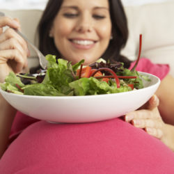 Health Diet is Important During Pregnancy | pregnant woman eating salad photo