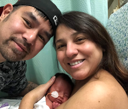 Diane with her husband and their newborn son she delivered through egg donation | Reproductive Science Center of the SF Bay Area