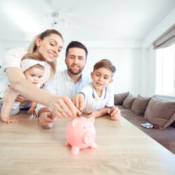young family puts money in piggy bank saved through CapexMD's financing assistance | Reproductive Science Center of the San Francisco Bay Area
