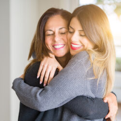 Women hugging and sharing infertility emotional health solutions | RSC San Francisco Bay Area