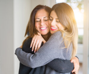 Women hugging and sharing infertility emotional health solutions | RSC of the San Francisco Bay Area